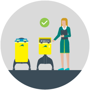 Healthcare worker checking a full Sharpsmart container beside another yellow Sharpsmart container.