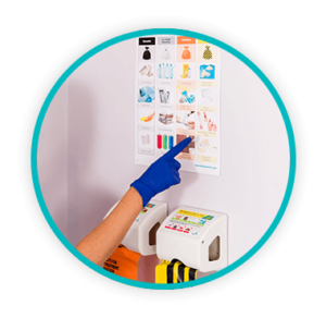 6 Education Poster B2B Gloved hand pointing to a healthcare waste segregation poster above clinical waste containers.