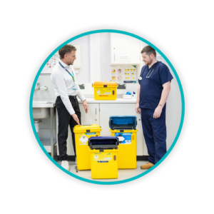 Circle image of Sharpsmart Health staff member training clinician on Sharpsmart containers